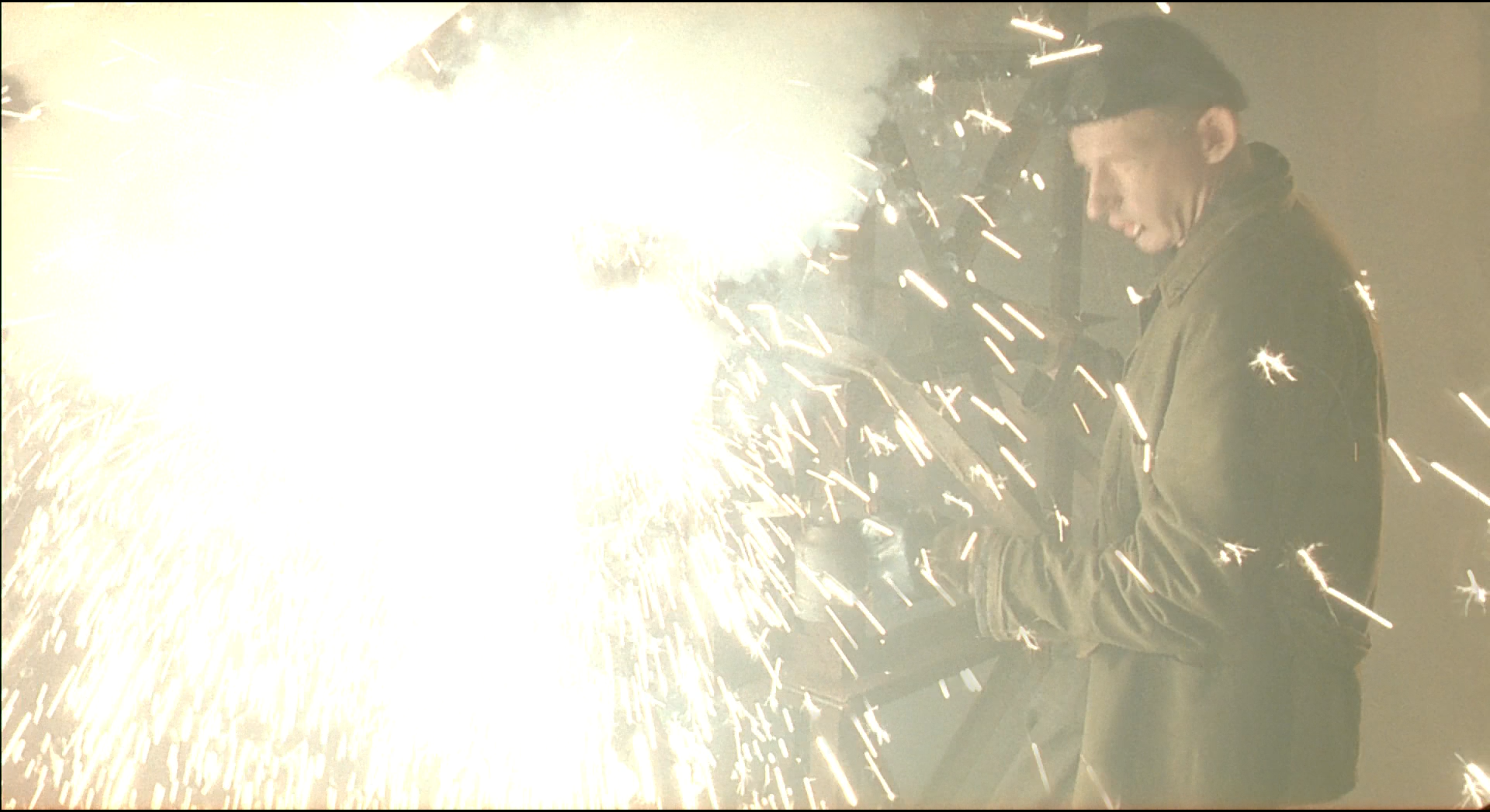 Shot 0886 from The City of Lost Children. A near-white rupture tests the highlight ceiling and the film's capacity for release.